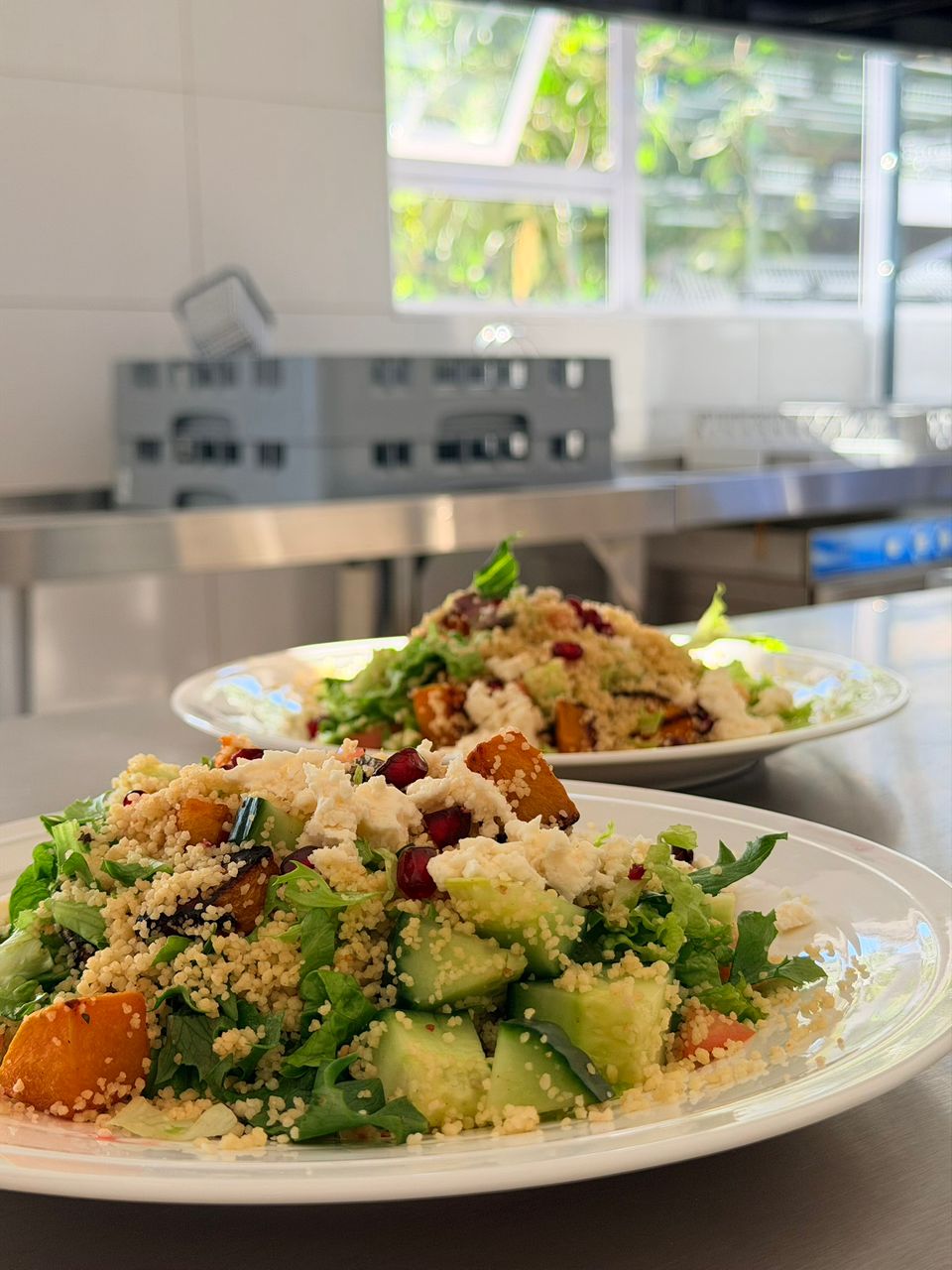 Mediterranean couscous salad with pomegranate and feta